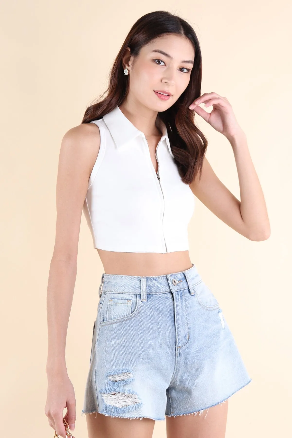 LALITA POLO SLEEVELESS TOP IN WHITE