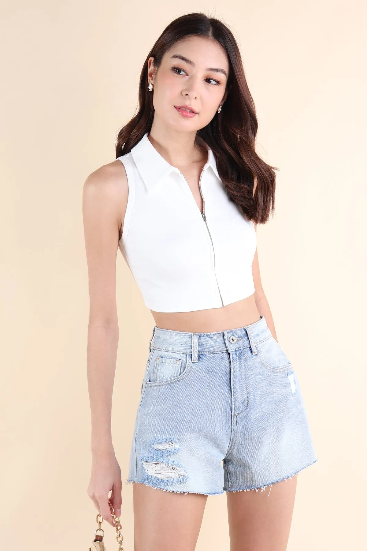LALITA POLO SLEEVELESS TOP IN WHITE
